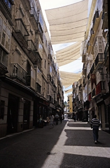 Large tarpaulins to provide shade for a street in the city centre of Cadiz, Spain, Europe