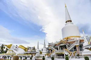 Framed Print : Large white pagoda and Buddha statue under the blue sky in the evening at Wat That Noi