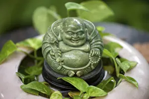 Laughing buddha monk statue India Asia