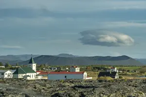 Lava field, the Reykjahlioarkirkja and the Hverfjall