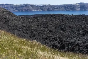 Lava scree, view of the caldera from the volcanic island of Nea Kameni
