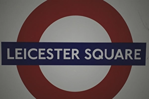 Leicester Square tube sign and underground station