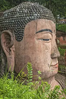 Leshan, China - July 2019 : The close up of the head of the Giant Leshan Buddha