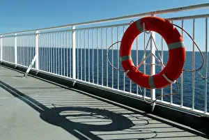 Category Scandinavia Prints: Lifebelt at railing on the sundeck of a ship