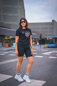 Lifestyle in the city. A young brunette with sunglasses