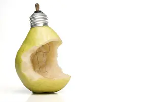A light bulb made out of a pear