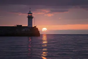 Lighthouse on sunrise. Yalta, Crimea, Ukraine