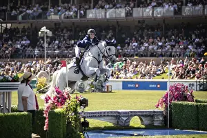 Lillie Keenan of the USA and riding Argan De Beliard compete in the first round of the 1