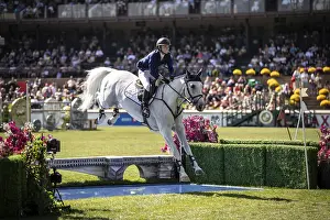 Category Historic EN Prints: Lillie Keenan of the USA and riding Argan De Beliard compete in the first round of the 1