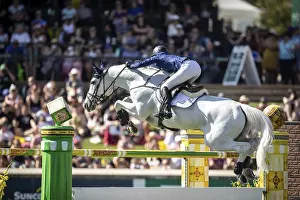 Lillie Keenan of the USA and riding Argan De Beliard compete in the first round of the 1