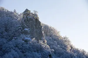 Limestone rock, snow, frost, winter