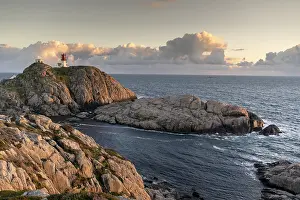Lindesnes lighthouse at rocky coast