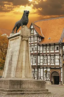 Lion statue and old timbered house in Braunschweig
