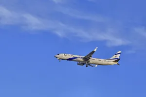 Lisbon, Portugal - Jan 14, 2025: El Al Airlines Boeing 737 shot mid-flight with landing gear extended