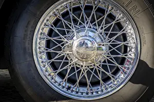 Category Oldtimer Prints: Lisbon, Portugal, Jan 20, 2024: Car design detail of Jaguar chrome wire wheel