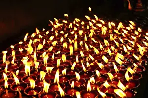Category Buddhism Prints: Lit oil lamps, monastery, Bodhnath