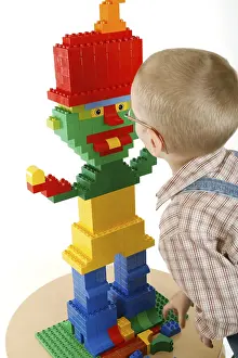 Little boy playing with bricks
