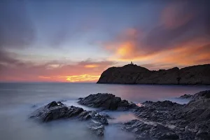 L'lle-Rousse Peninsula with Da le Pietra Lighthouse at sunset