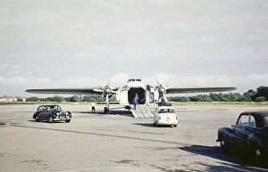 Loading cars onto a Silver City Airways cargo plane in the English Channel, Le Touquet Airport, France, Europe July 1961, Europe