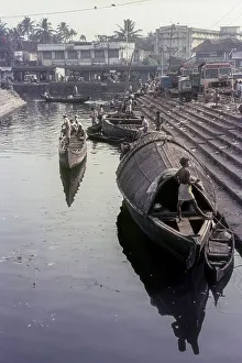 Loading and unloading of goods from cargo boats at Ernakulam market boat jetty