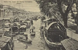 Local workers in the city, canal with many boats and foreign concession