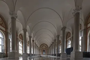 Long corridor with vaulted ceilings and columns