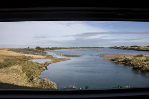 Looking north from the Sanctuary hide at RSPB Snettisham over oystercatchers