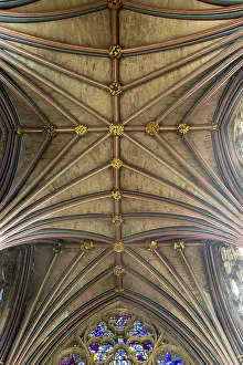 Framed Print : Looking up at vaulted ribbed ceiling inside Exeter cathedral church