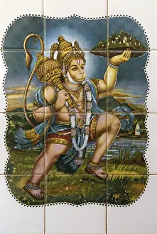 Lord Hanuman monkey God lifting Dronagiri mountain hand Gada right hand painted glazed tiles Temple Devgad fort