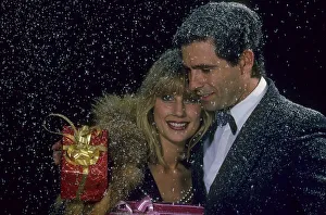 Lovers with Christmas Present, Snowflakes on Shoulder