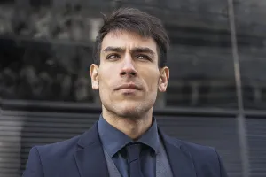 Low-angle view of an attractive executive man looking away