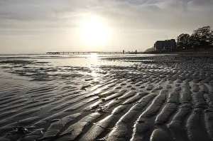 Low tide, wave and ripple patterns in wet sand