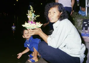 Loy Krathong is held annually on the full moon night of the 12th month in the traditional Thai lunar calendar