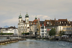 Lucerne - the reuss river and a church in background - Switzerland