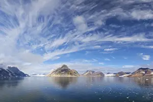 Luciapynten, mountain with steep sea cliffs in Hornsund fjord in summer
