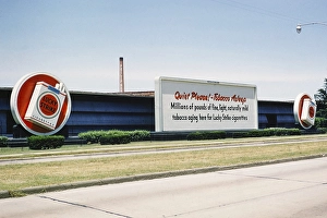 Lucky Strike cigarette advert, Philip Morris tobacco factory, probably in Durham, North Carolina. USA around 1953