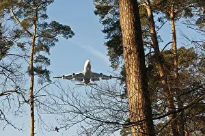 Lufthansa Boeing 747-400 approaching to land over Frankfurt's city forest