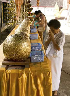 Luk nimit are stone spheres used for burying at the four corners and the four cardinal points of a new ubosot