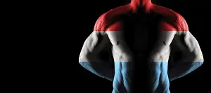 Luxembourg flag on muscled male torso with abs