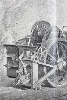 Machine for breaking up old road surfaces