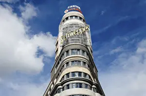 Madrid, Spain, September 18, 2016: Low angle view of Capitol building at Gran Via Street in Madrid