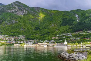 Magnificent Hardanger fjord between forested mountains