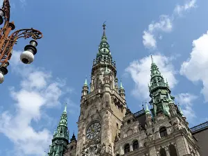 Magnificent old town hall with towers and copper roofs