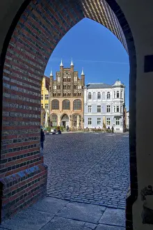 Magnificent red-blue medieval building with opulent facade on the Old Market Square