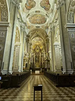 Magnificently decorated baroque interior with altar and ceiling frescoes