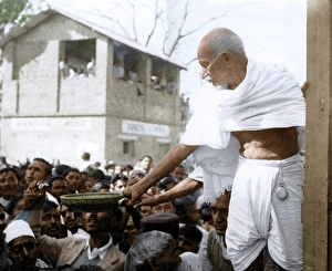 Mahatma Gandhi collecting donations on platform for Harijan Fund, India, Asia, January 1946, Asia