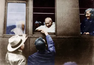 Mahatma Gandhi greeting people from train, way to Switzerland, France, December 5, 1931, Europe