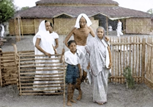 Mahatma Gandhi, Kasturba and others passing through gate, Wardha, India, 1940, Asia