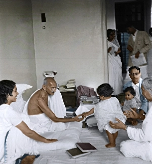 Mahatma Gandhi playing with child, Birla House, Mumbai, Maharashtra, India, Asia, June 1945, Asia