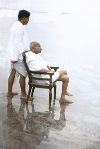 Mahatma Gandhi sitting on chair and Devdas Gandhi, Juhu Beach, Mumbai, Maharashtra, India, Asia, May 1944, Asia